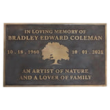 Memorial plaque for Bradley Edward Coleman with tree design and text on a white background