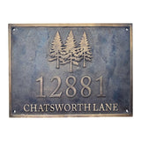 Bronze sign with trees and text '12881 CHATSWORTH LANE' on a textured background
