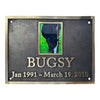 Memorial plaque for a horse named Bugsy with a photo and dates on a dark background