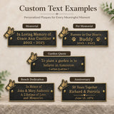 A digital mockup showing six customizable memorial plaque designs on a light textured beige background. The plaques are dark gray with gold borders and gold decorative elements like butterflies and small gold dots.