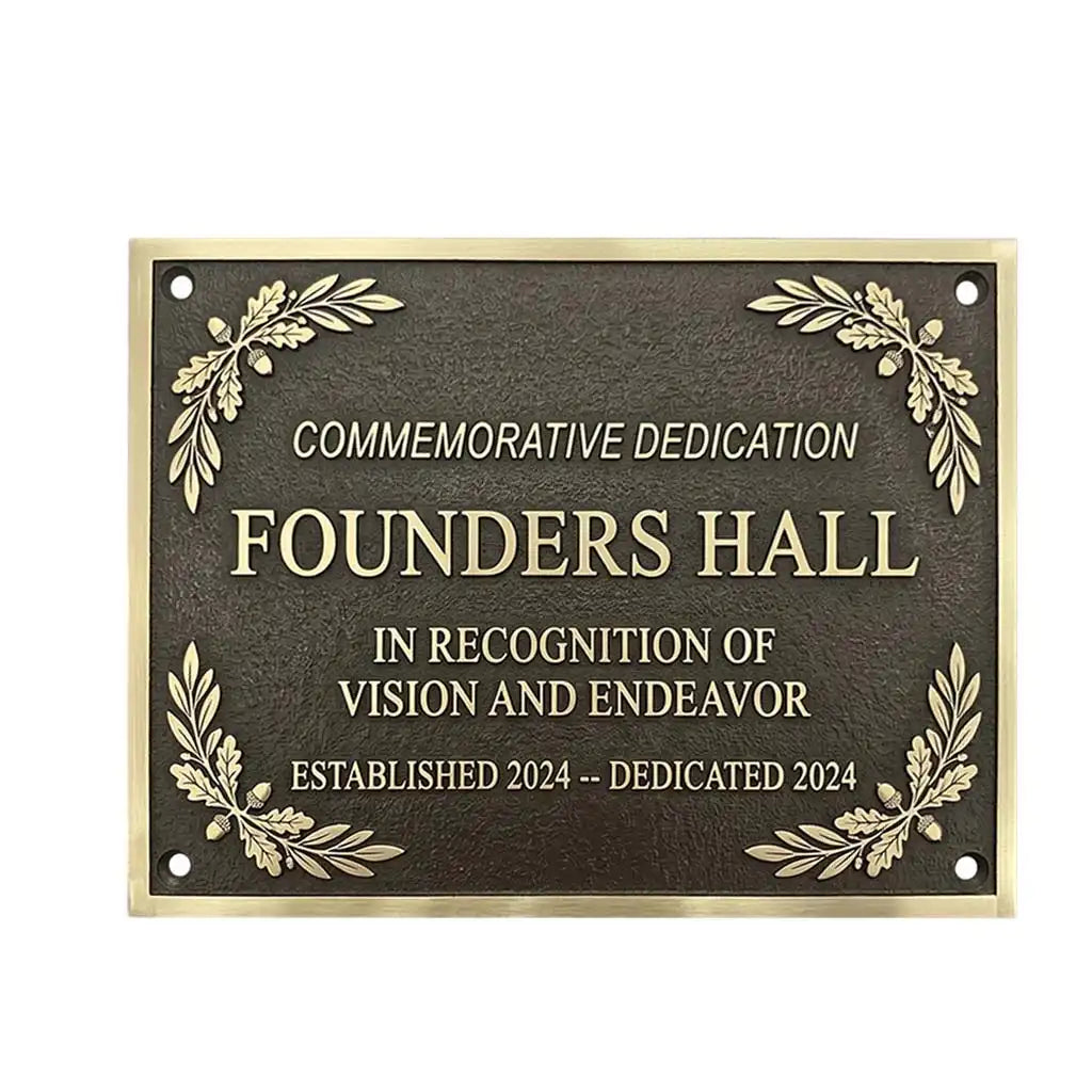 Plaque commemorating Founders Hall with decorative elements on a white background