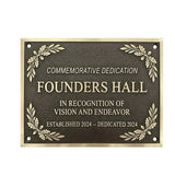 Plaque commemorating Founders Hall with decorative elements on a white background