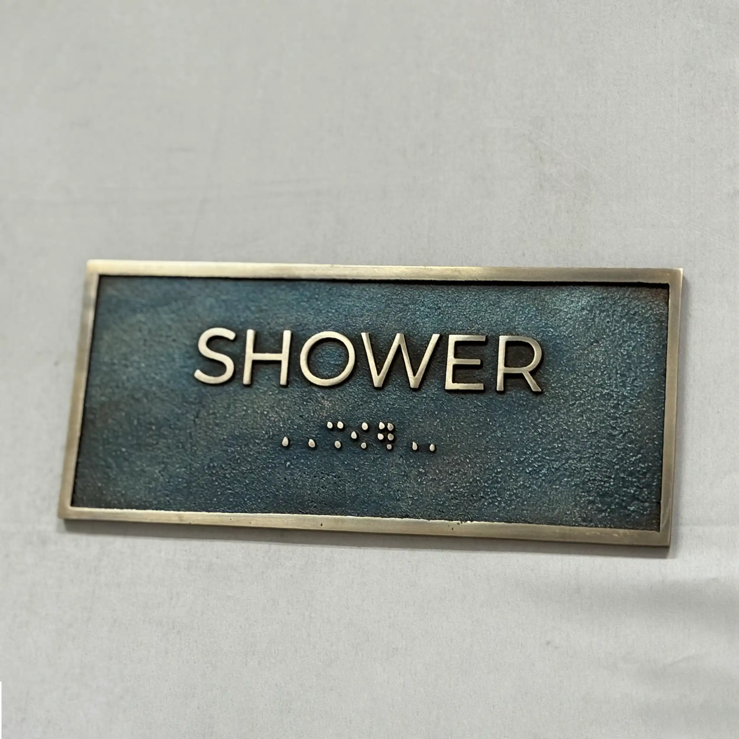 Rectangular green metal shelf on a white background