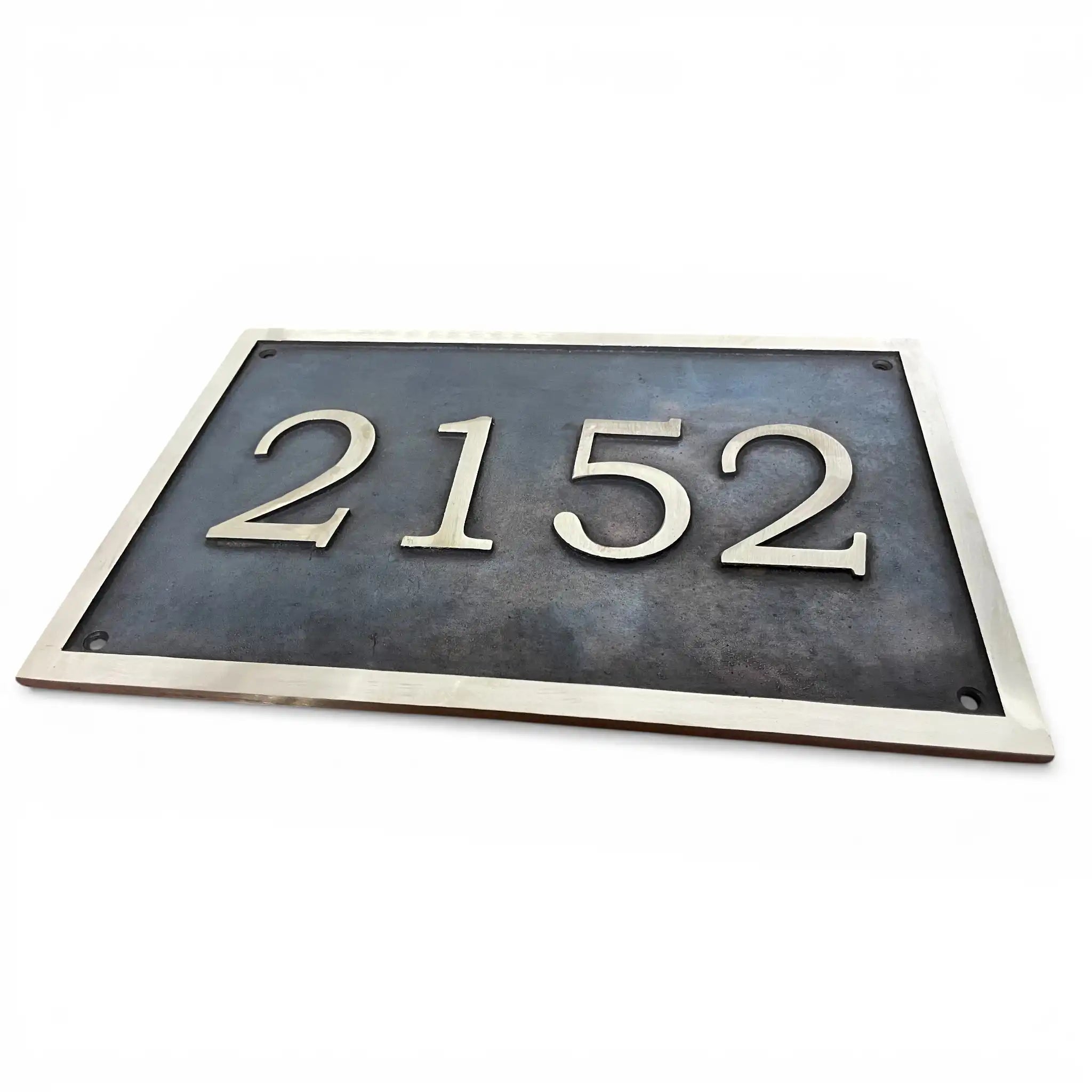 Custom cast bronze address sign designed for outdoor use House number plate with '2152' on a white background