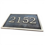 Custom cast bronze address sign designed for outdoor use House number plate with '2152' on a white background