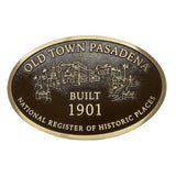 Bronze historical plaque with 'Old Town Pasadena' text and building illustration on a white background