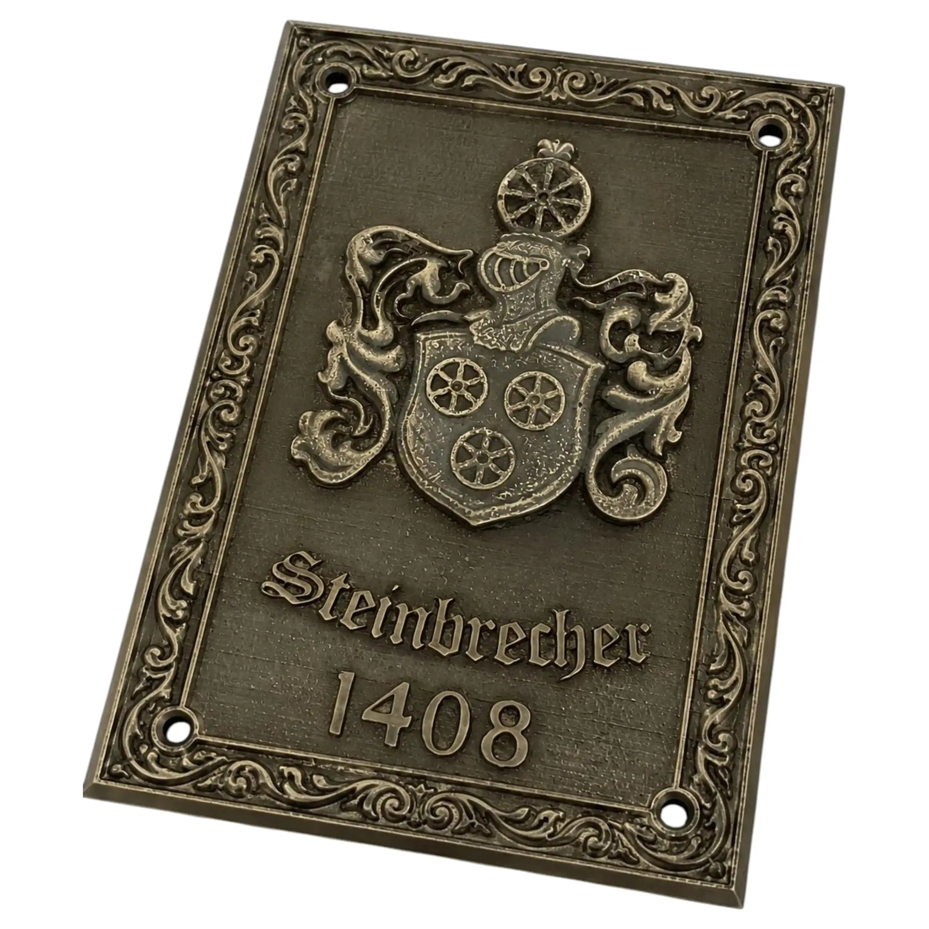 An ornate rectangular metal plaque with a decorative crest and the text 'Stembrecher 1408' in an antique bronze finish, shown on a plain white background.