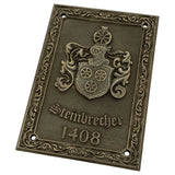 An ornate rectangular metal plaque with a decorative crest and the text 'Stembrecher 1408' in an antique bronze finish, shown on a plain white background.