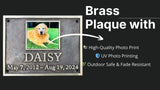 Brass plaque with a photo of a dog named Daisy and text about the product features on a black background.