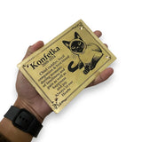 Hand holding Pet Memorial Marker with a cat illustration and text on a white background