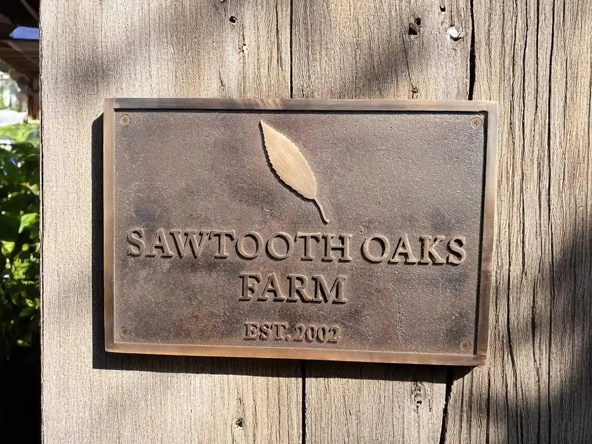 Bronze Address Plaques with 'Sawtooth Oaks Farm' on a wooden background