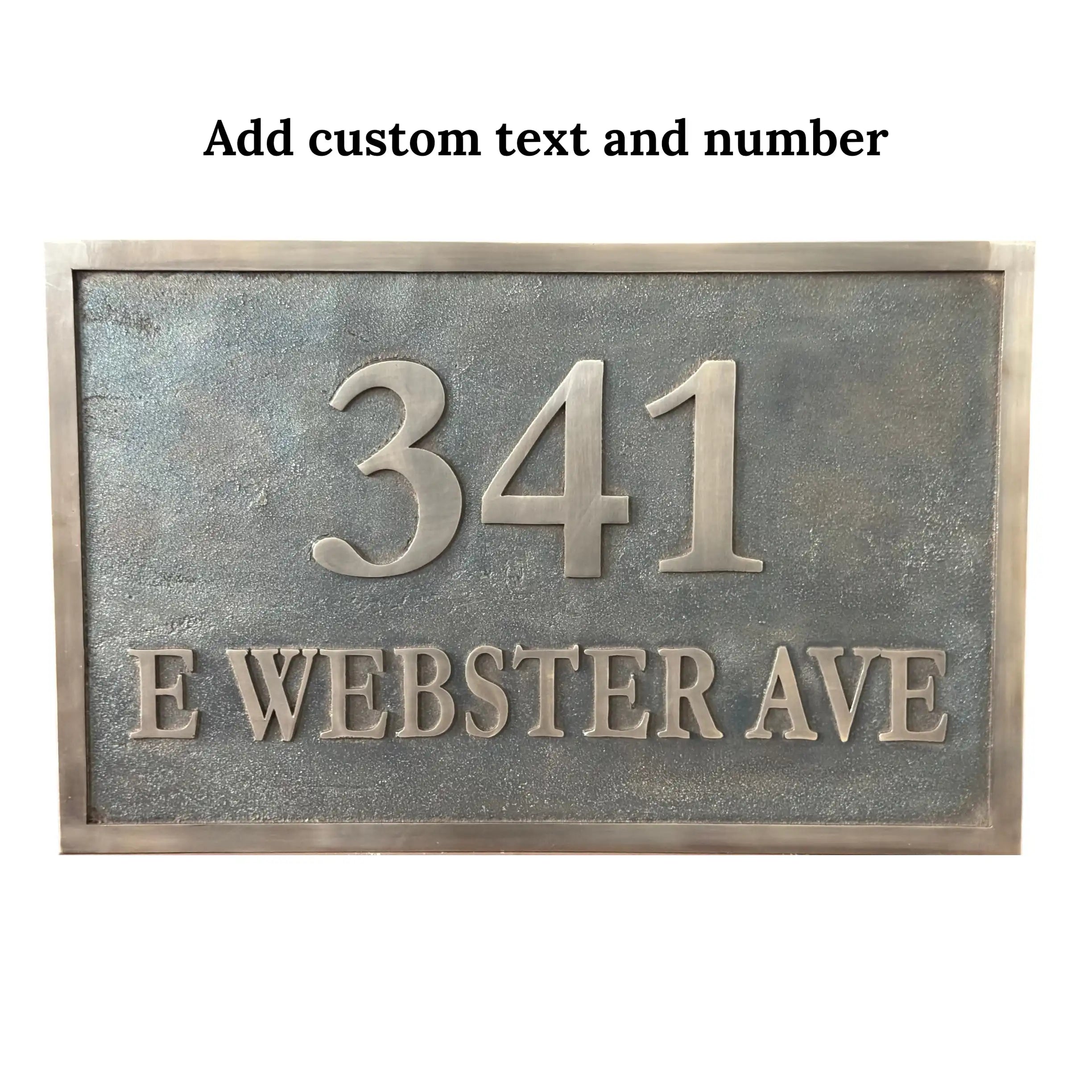 Metallic bronze house number sign with text '341 E Webster Ave' on a white background