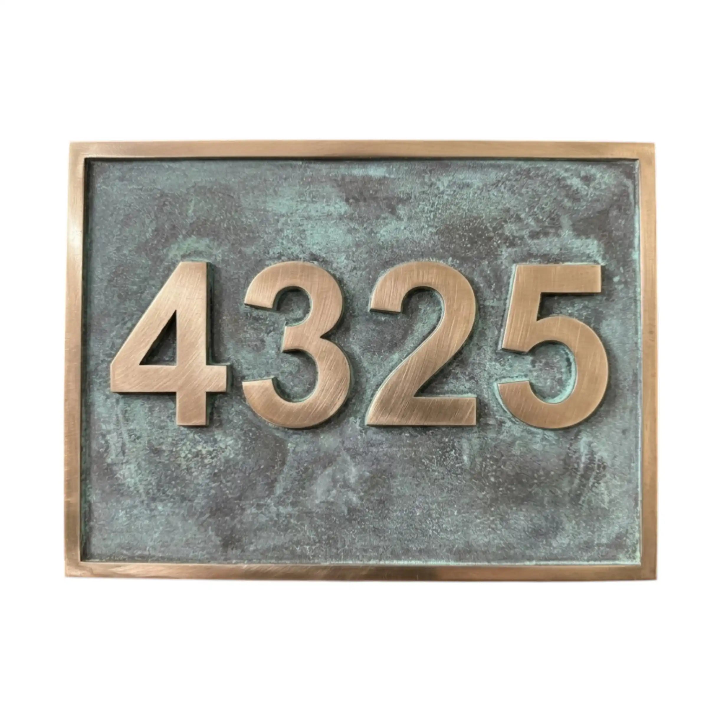 Bronze house number plaque with '4325' on a textured background and patina finish