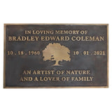 Memorial plaque for Bradley Edward Coleman with tree design and text on a white background
