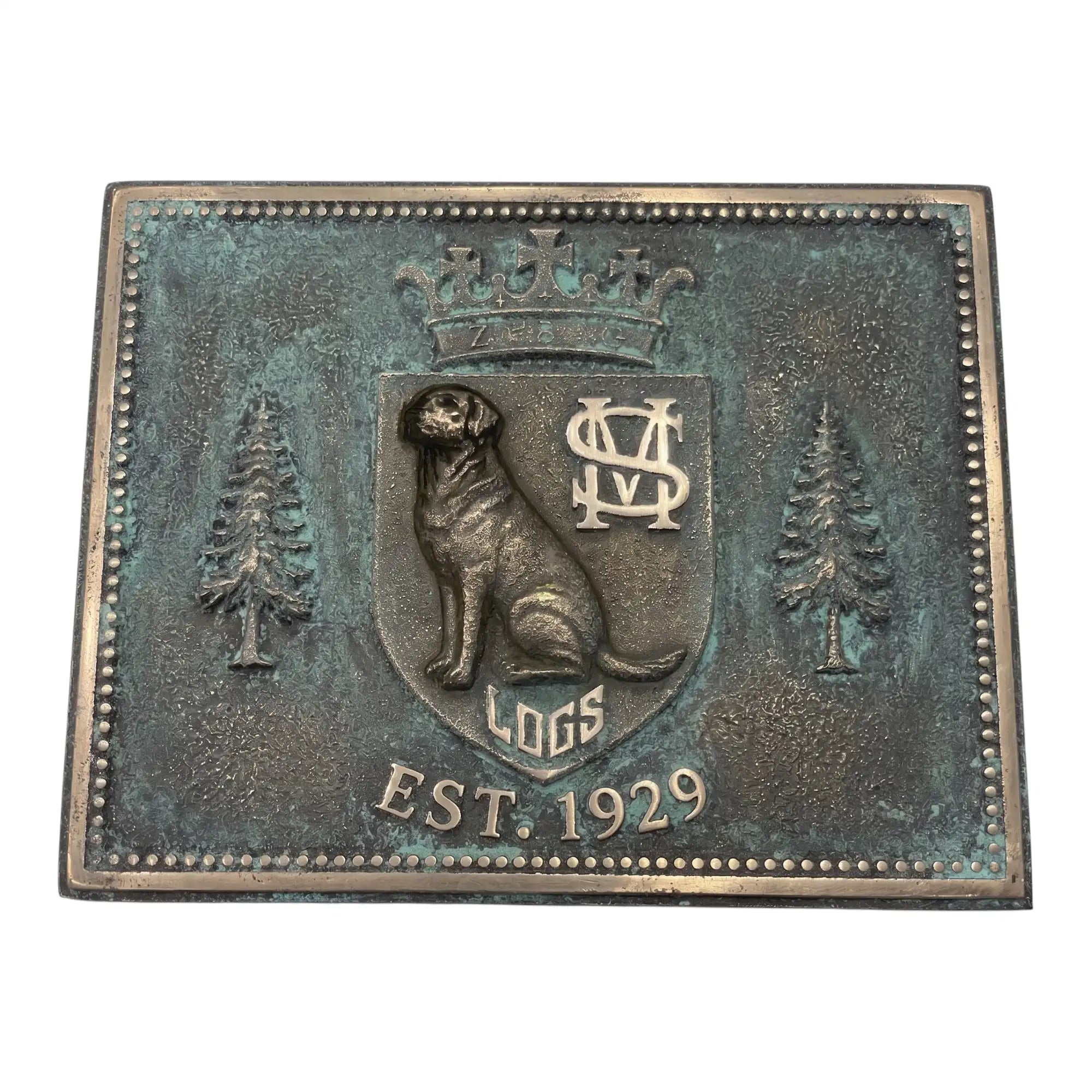 Bronze plaque with a bear emblem, trees, and 'Est. 1929' text on a white background
