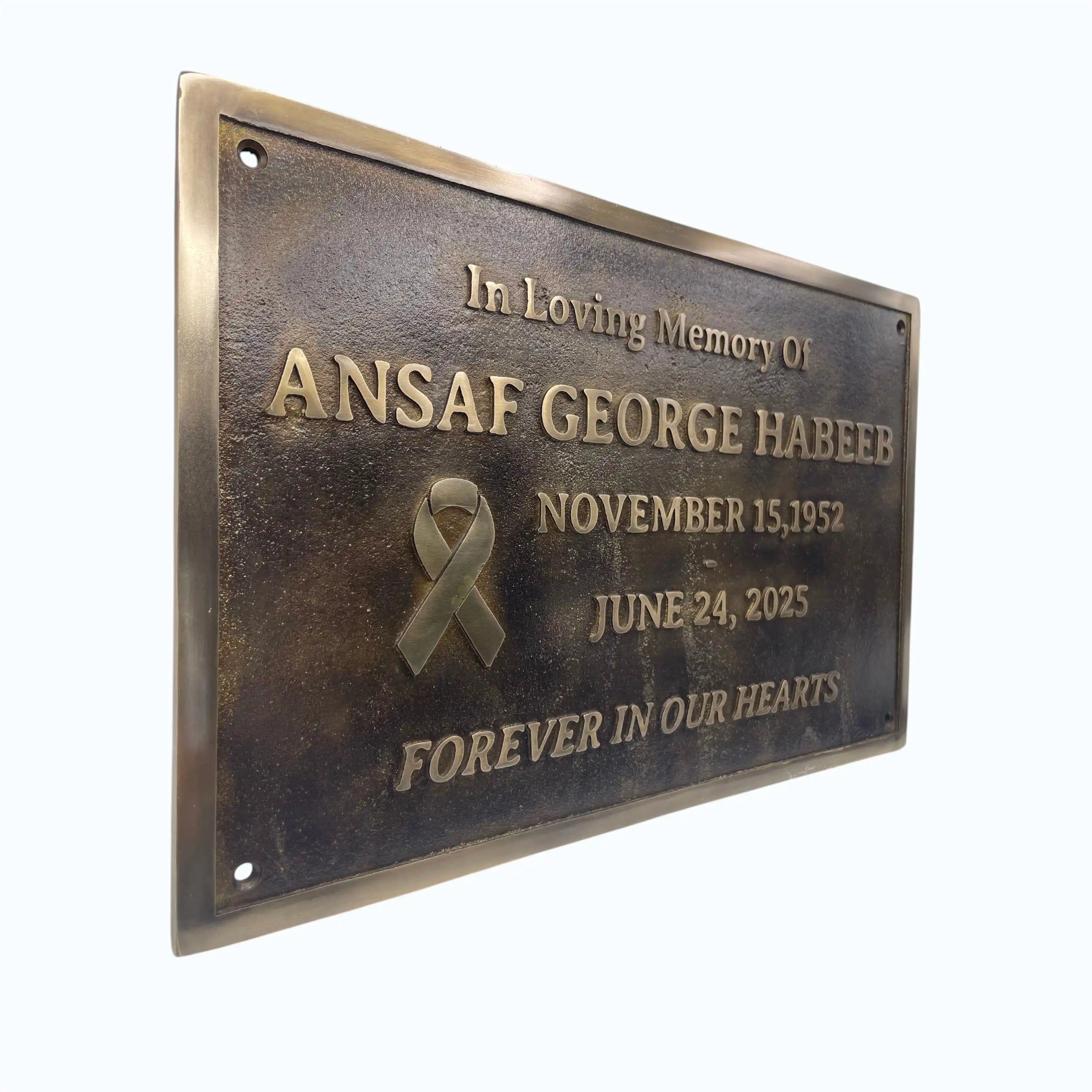Memorial plaque for Ansaaf George Habeeb with a gray ribbon symbolizing awareness.