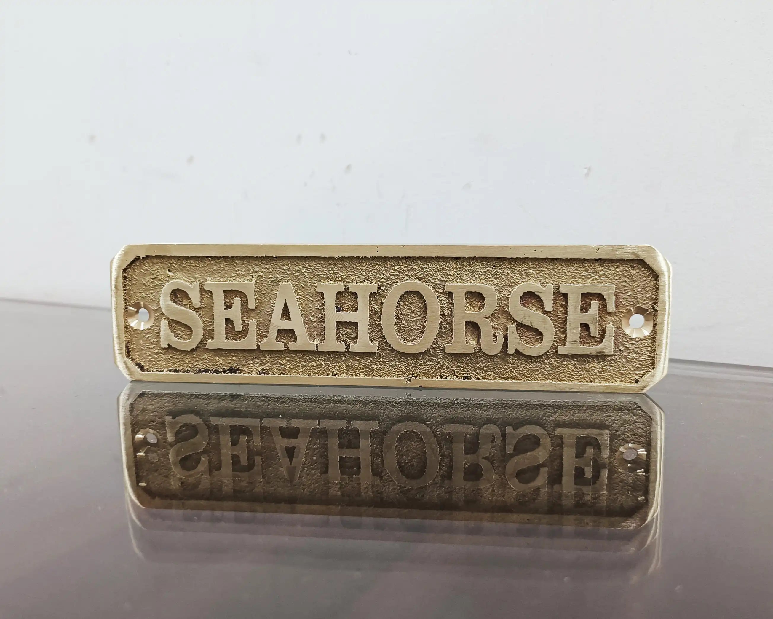 Cast brass custom nautical signs