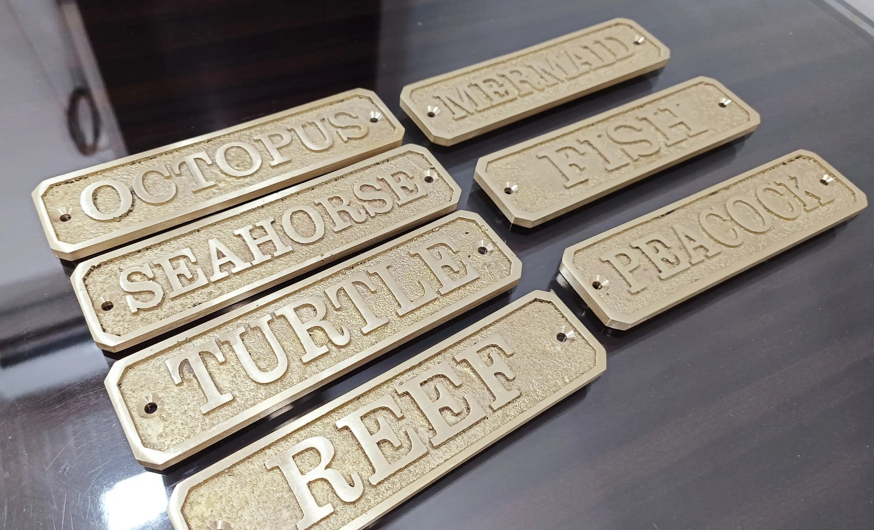 Cast brass custom nautical signs