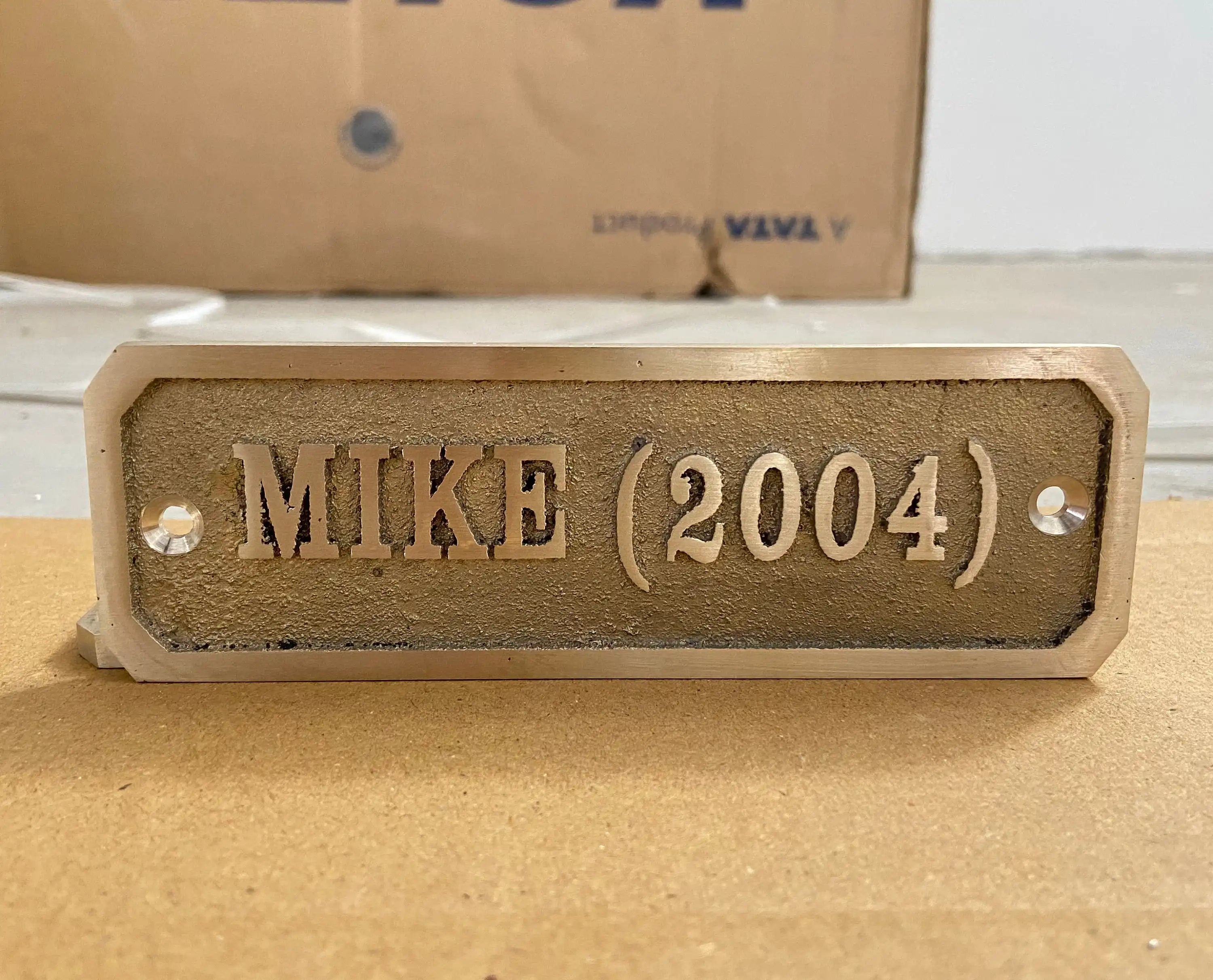 Cast brass personalized signs