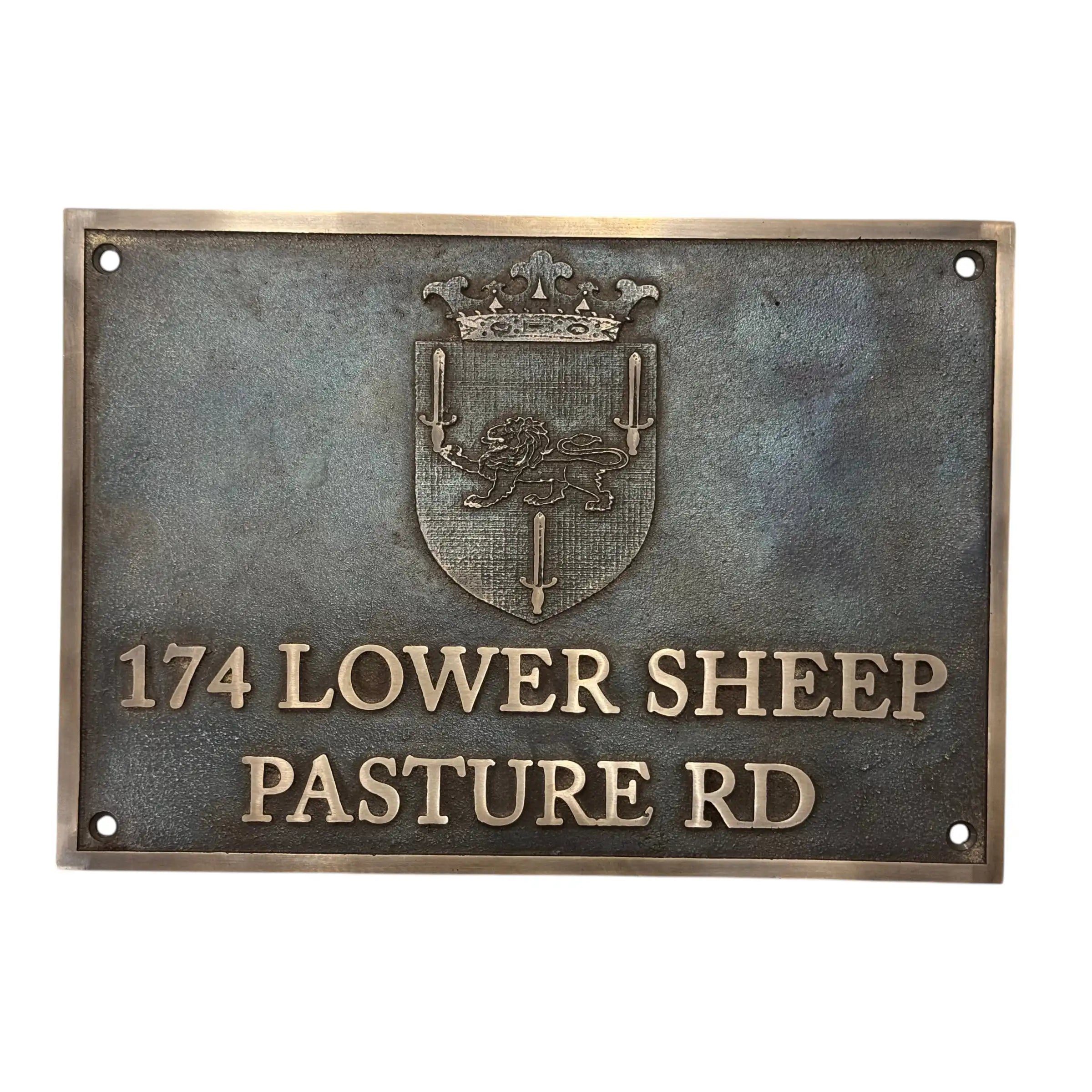 Metallic plaque with a crest and text on a white background