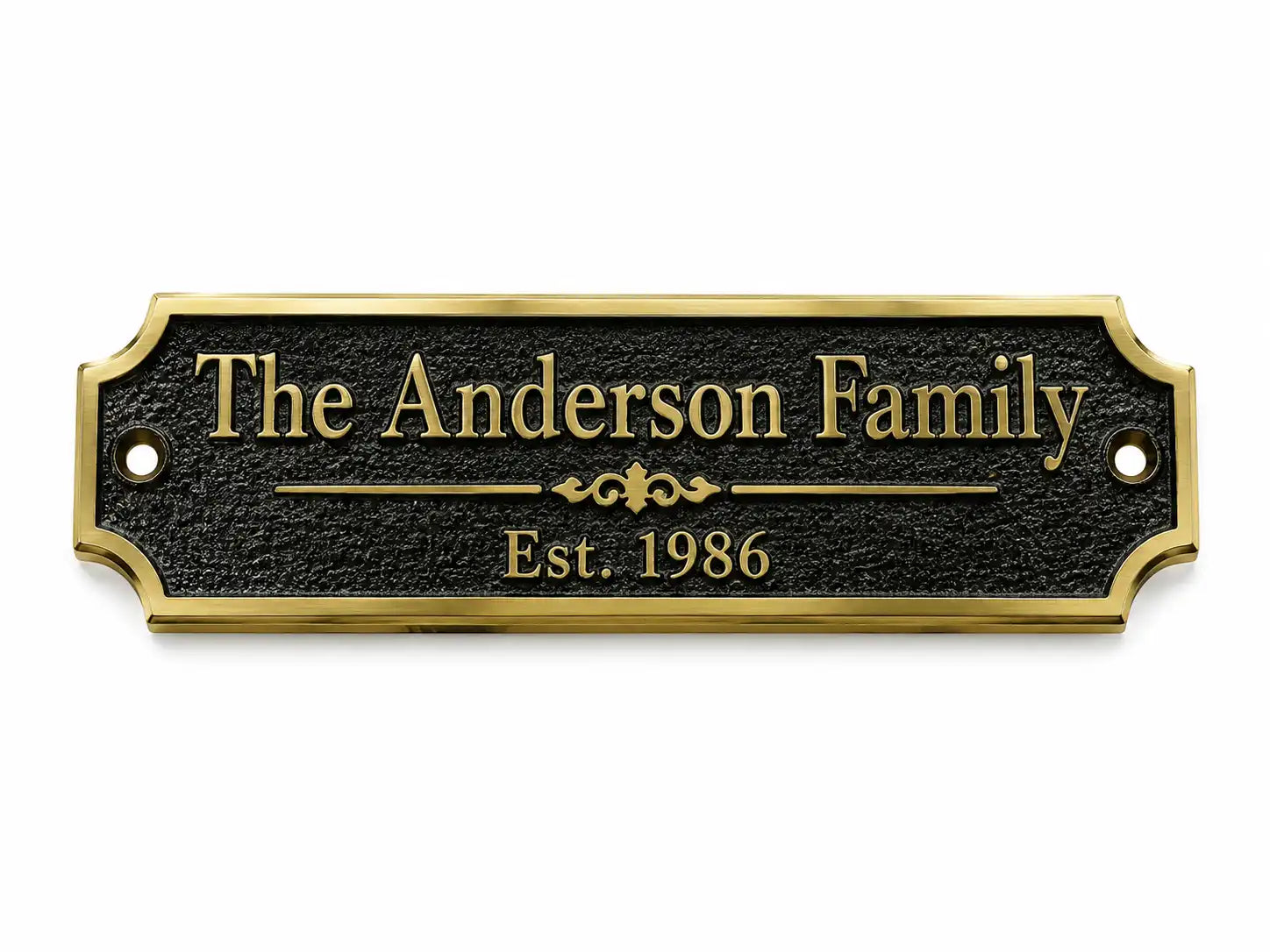 A personalized black metal house plaque with a gold border and gold lettering that reads 'The Anderson Family' and 'Est. 1986', shown on a plain white background.
