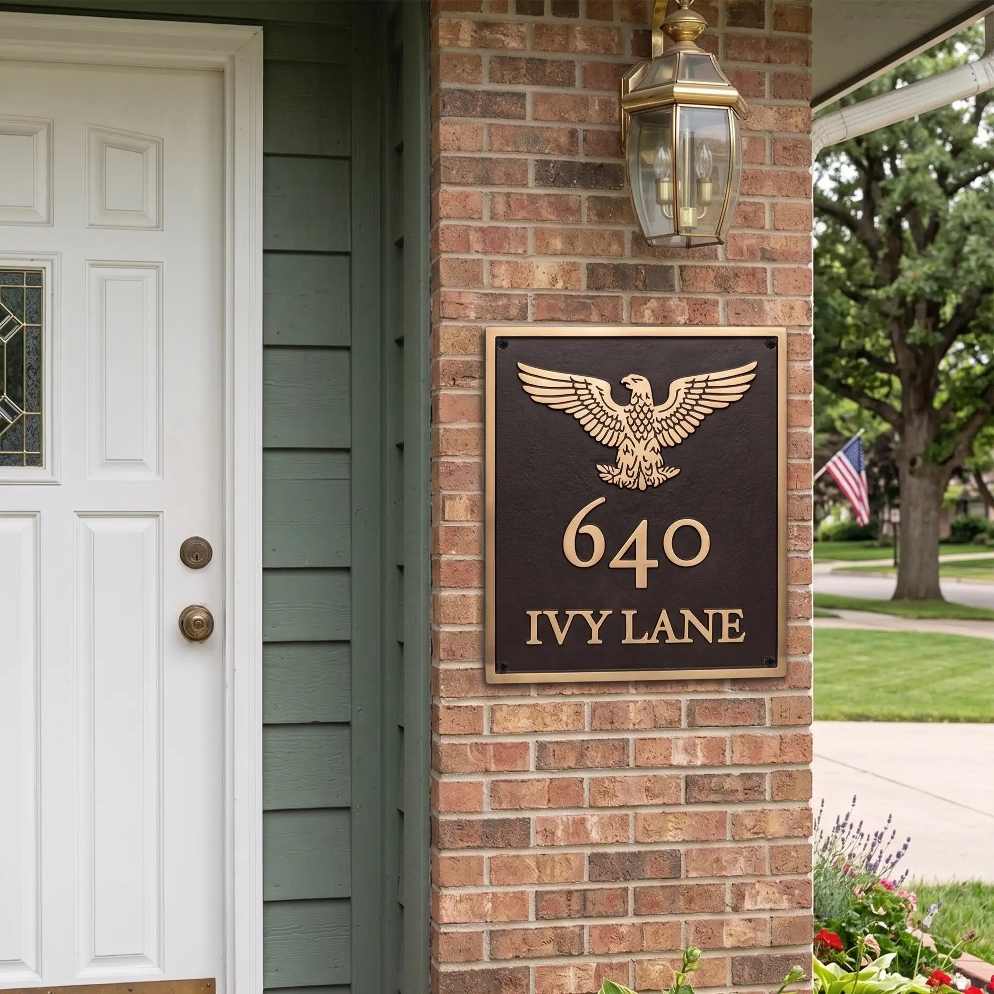 Custom address plaque in a bronze and gold finish featuring an eagle emblem