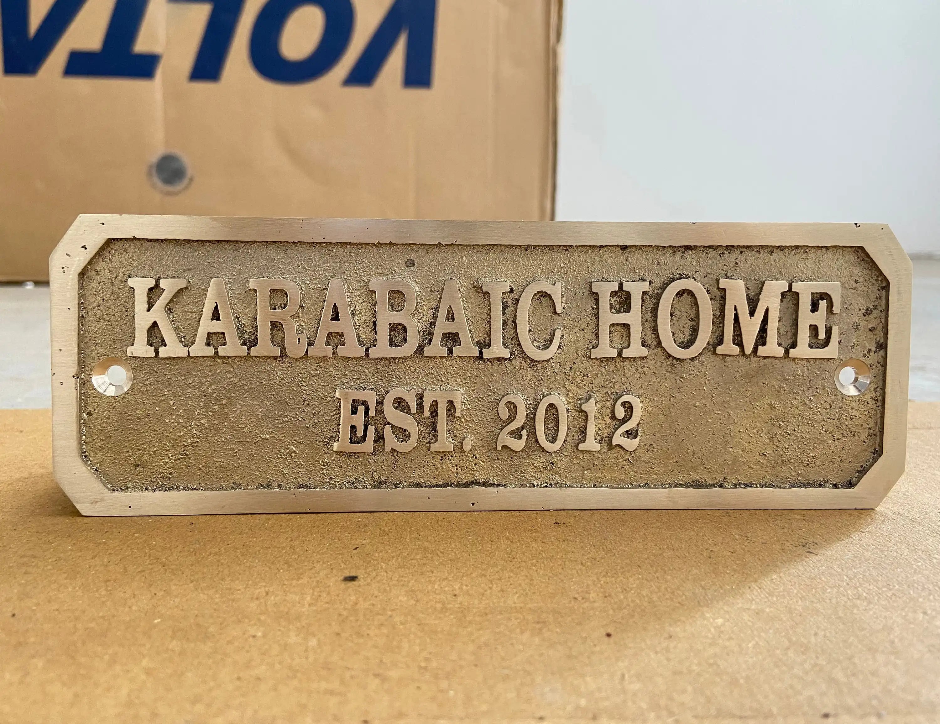 Personalized cast brass house signs