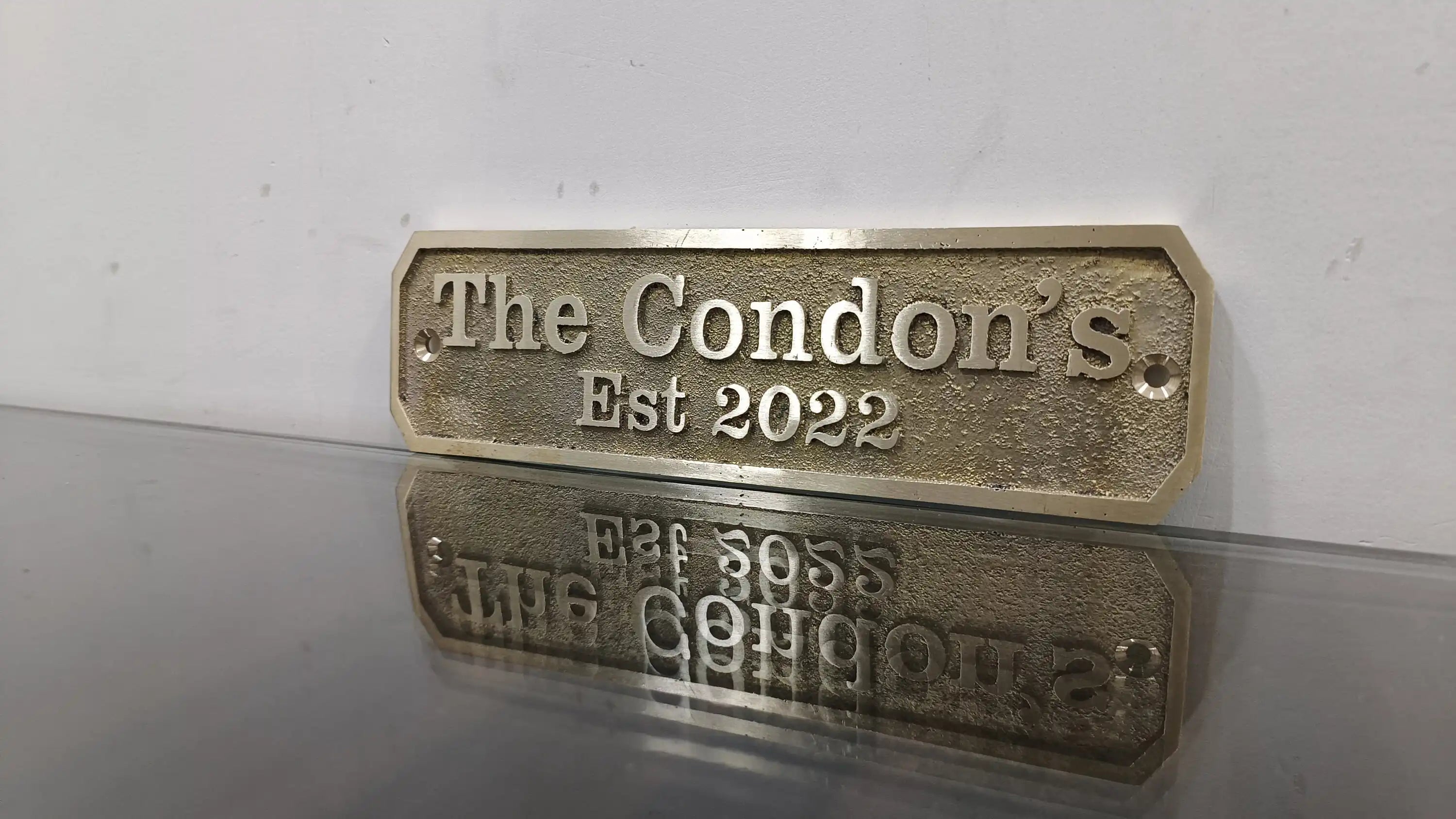 Personalized cast brass house signs