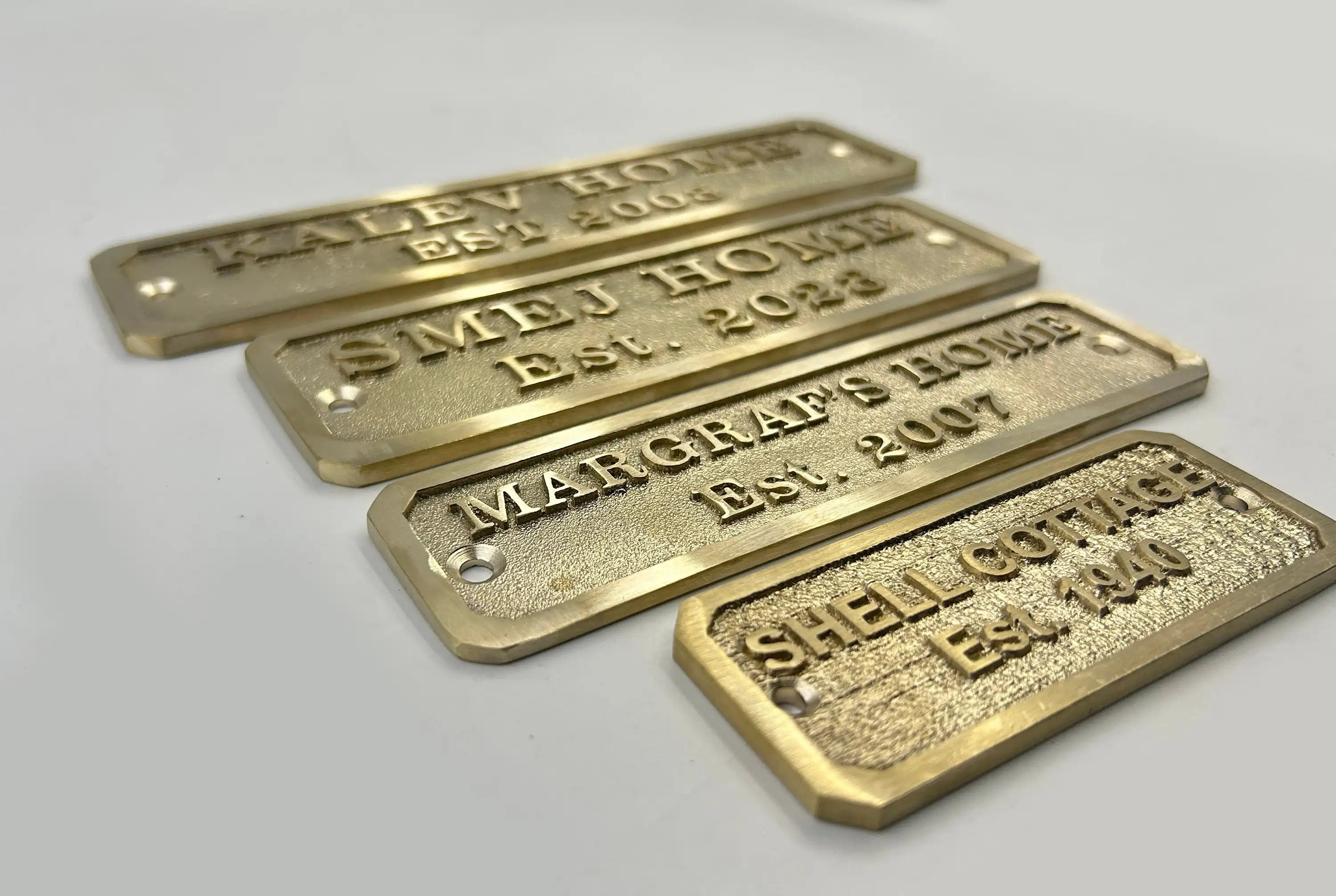 Personalized cast brass house signs