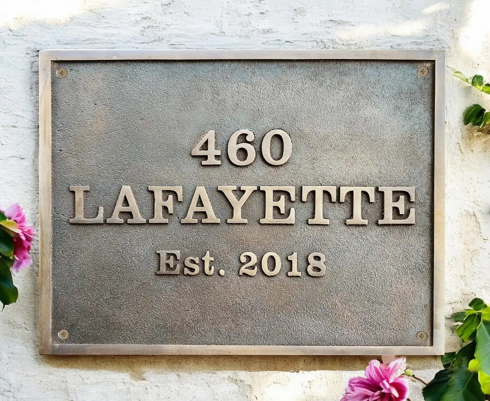 Custom Bronze Plaque – Bronze address plaque installed at a front entrance