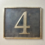 Custom bronze address plaque with antique finish and raised numerals