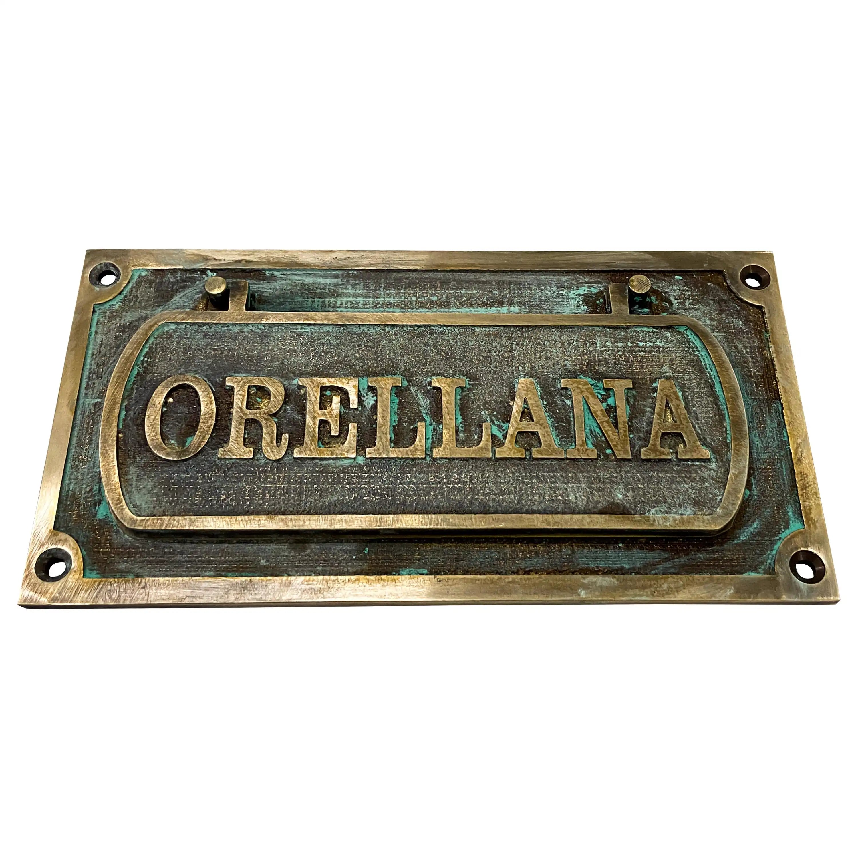 Decorative mail slot for door shown from side angle view