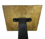 Gold metal bracket with black support on a white background