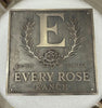 Custom Bronze Plaques -  Address Plaques with 'E' and floral design, featuring 'Every Rose Ranch' text.
