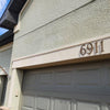 Large custom solid bronze house numbers with oil rubbed bronze finish for estate entrances and architectural signage.